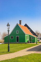 Historic green wooden house in the Zaanse Schans village, Netherlands
