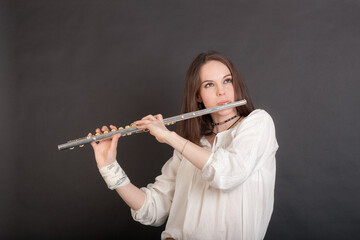 woman playing the flute