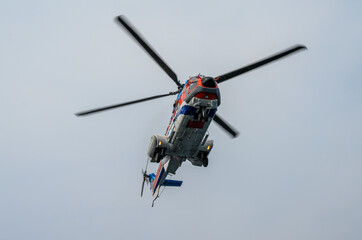 A helicopter flying in the sky.