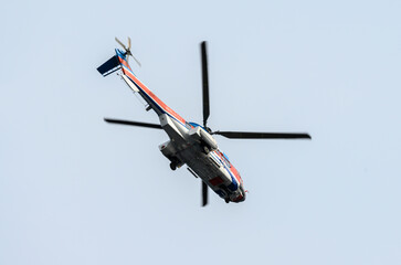 A helicopter flying in the sky.