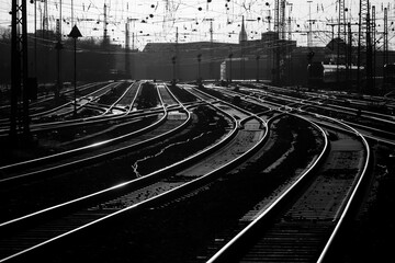 Many curved parallel railway tracks at Dortmund Main station Germany with switches, signals,...