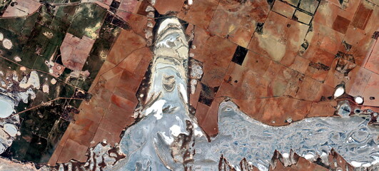 abstract landscape of the deserts of Africa from the air emulating the shapes and colors of the...