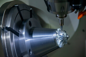 The  5-axis  machining center cutting the turbocharger parts with solid ball end mill tool.