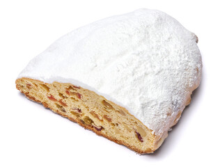Sliced Traditional Christmas stollen cake with marzipan and dried fruit isolated on white background