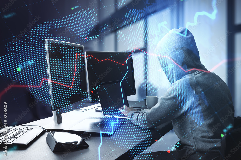 Poster Hacker at table using computers with creative glowing blue map hologram with chart and grid on blurry office interior background. Economy, hacking, world and stock concept. Double exposure.