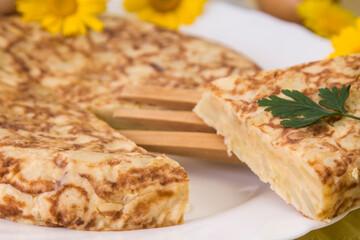 spring omelette of eggs, potatoes and onion with olive oil
