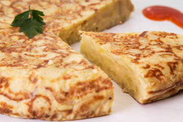 Spanish omelette with potatoes and onion, typical Spanish cuisine. Tortilla espanola