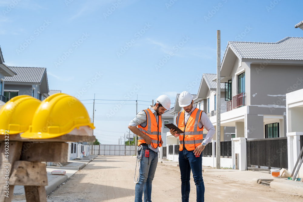 Poster Architect and engineers to discuss ideas in building site,Engineering construction teamwork concept.