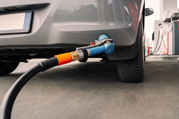 Fuel car. Pump petrol from nozzle in vehicle tank. Gasoline, oil gas station. Economy business with diesel transport. Automotive transportation concept.