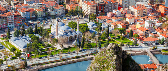 Amasya,TURKEY old riverside Turkish(ottoman) city buildings and its reflection on water,sunny summer day.Amasya is city of princes of ottoman. ottoman Princes were educated in Amasya