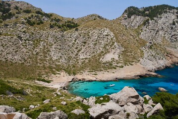 Panoramic view of Cala Figuera with white sand and turquoise water. Majorca, Spain.