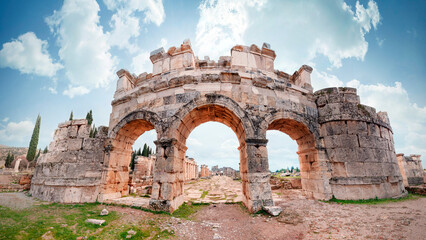 Fototapeta na wymiar Amphitheater at the ruins of hierapolis in pamukkale, turkey. Unesco world heritage site in turkey. Ruined ancient city in europe. Turkey. Amphitheater. Columns