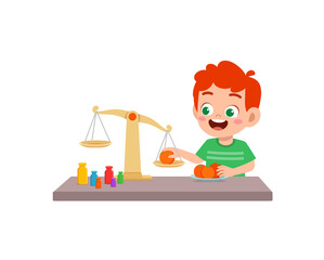 little boy study about weighing scale to balance object