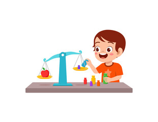 little boy study about weighing scale to balance object