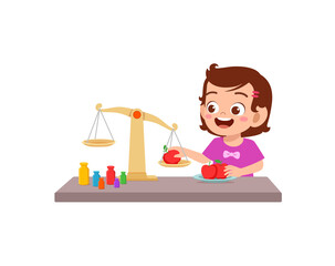 little girl study about weighing scale to balance object