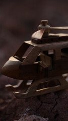 close up of a wooden helicopter miniature
