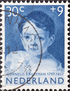 Netherlands - circa 1957: a postage stamp from the Netherlands, showing a child's portrait: "Niece of the Painter" by Cornelius Kruseman