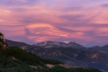 Sunset colors in the clouds over the Catalan Pyrenees mountains