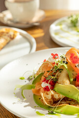 traditional Russian pastries: pancakes for Maslenitsa, pancakes with salmon, pancakes with honey, pancakes for breakfast