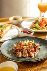 traditional Russian pastries: pancakes for Maslenitsa, pancakes with salmon, pancakes with honey, pancakes for breakfast