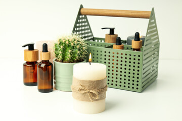 Concept of relaxation with aroma candle on white table
