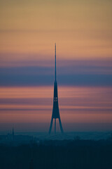 Fototapeta na wymiar Sunrise in the city, tower, pastel colors