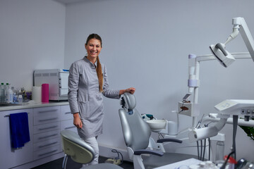 Portrait of female dentist in her office