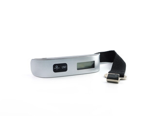 small mini portable digital luggage scale with black strap for checking the total weight of the persernal suicase or travel luggage before checking in at the airport isolated on white background