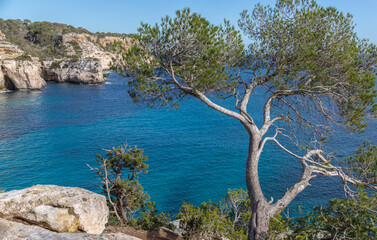 Beautiful turquoise cove with transparent water on the island of Menorca