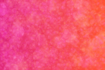 Abstract background with gradient from orange to pink and circle shaped random spots pattern