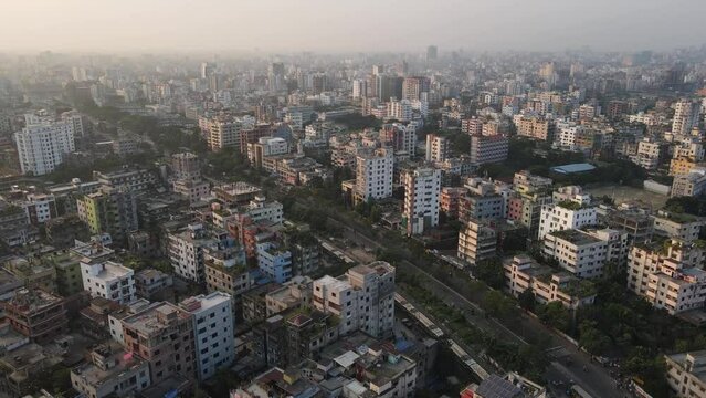 Drone Flight Above Dhaka Huge City Full Of Buildings As Train Cross It, India