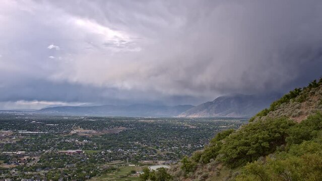 Rain storm moving over Salt Lake Valley in Utah in timelapse.