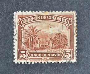 Cancelled postage stamp printed by Colombia, that shows Coffee Plantation, circa 1936.