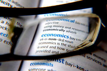 glasses and the word "economics"
