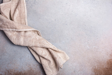Linen napkin on grey concrete background