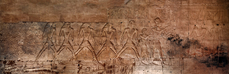 Detail of the relief, drawing with hieroglyphs based on the mythology of ancient Egypt - Temple of Sethy the First at Abydos - Middle Egypt