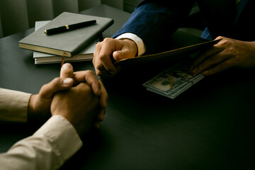 The businessman receives money in an envelope proposed on file. Evil Concepts Bribery Corruption...