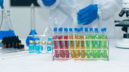 Researchers, doctors, scientists work with plastic medical tubes in modern laboratories or hospitals. Biotechnology Expert On Advanced Equipment Chemistry Lab Medicine Experiment For Hospital