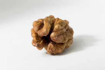 Walnuts are rounded, single-seeded stone fruits of the walnut tree.