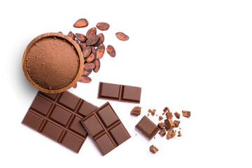 Cocoa powder in wooden bowl and cacao beans with chocolate bar isolated on white background. Top view. Flat lay.