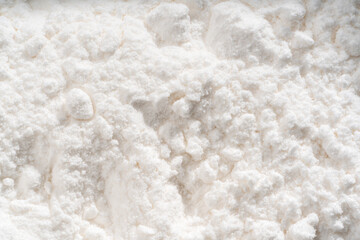 Fototapeta na wymiar Detailed and large close up shot of powdered sugar.