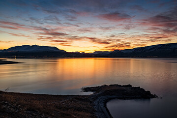 Fototapeta premium View from the other side of Akureyri at sunset, Iceland