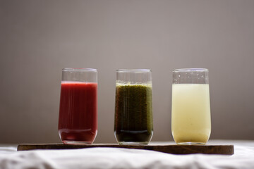 glass of juice and fruits