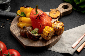 a variety of grilled vegetables. bell pepper. corn, mushrooms,