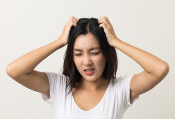 Young woman itchy head There is a fungus on the scalp dandruff, red rash She scratched her head to...
