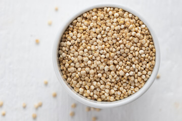 quinoa seeds in a white bowl