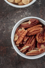 Pecan nuts on a dark background