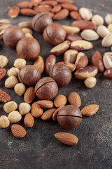 Assorted nuts on a dark background