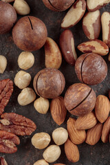 Assorted nuts on a dark background