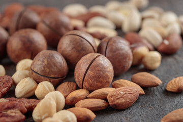 Assorted nuts on a dark background